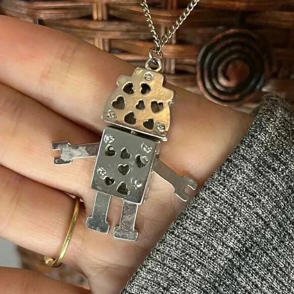 Articulating robot necklace on a silver tone chain - Picture 4 of 5